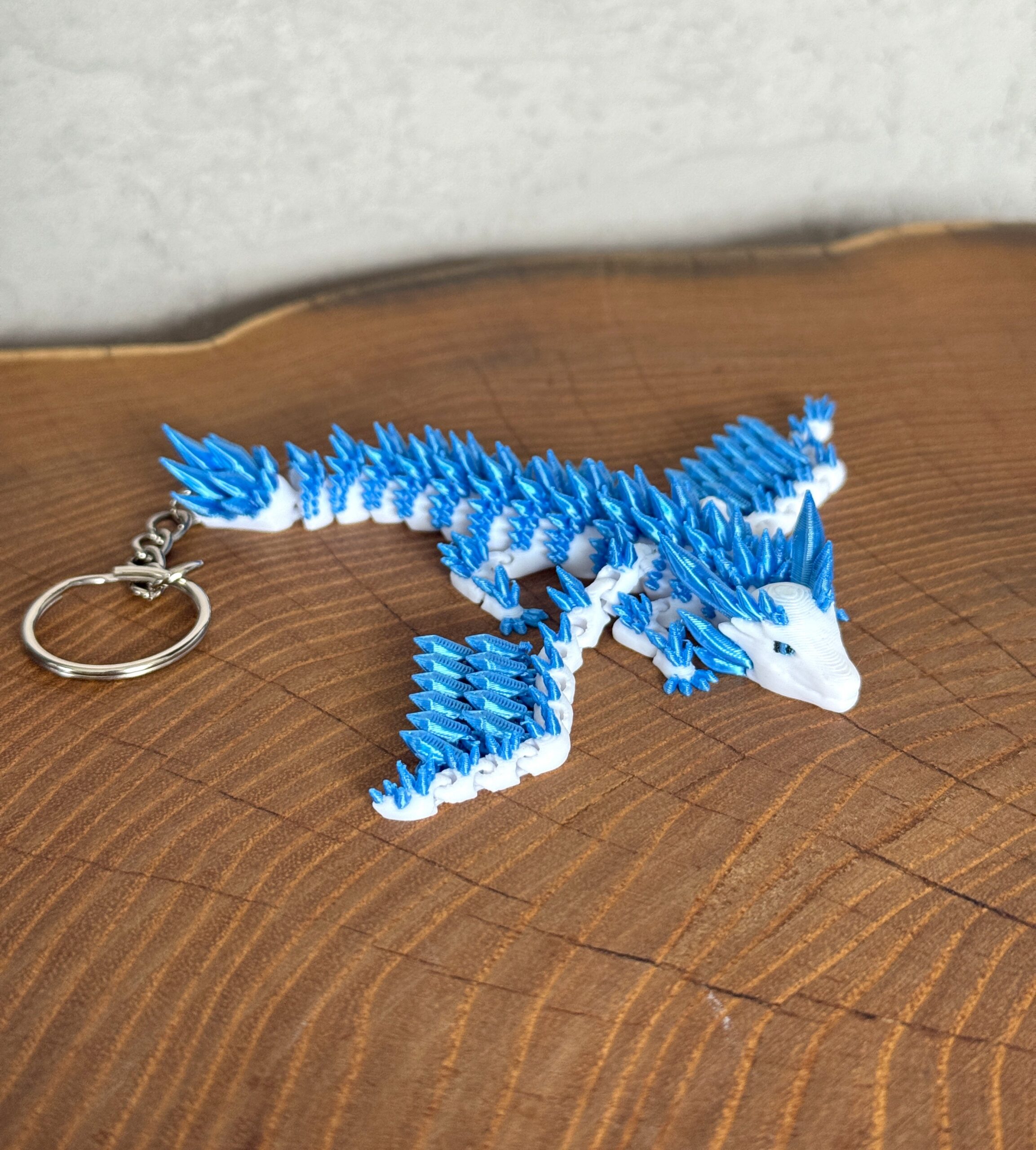 Lodowy Smok ze skrzydłami – Brelok, przegubowa figura 3D zrodzona z mrozu i kryształów, zabawka - obrazek 14