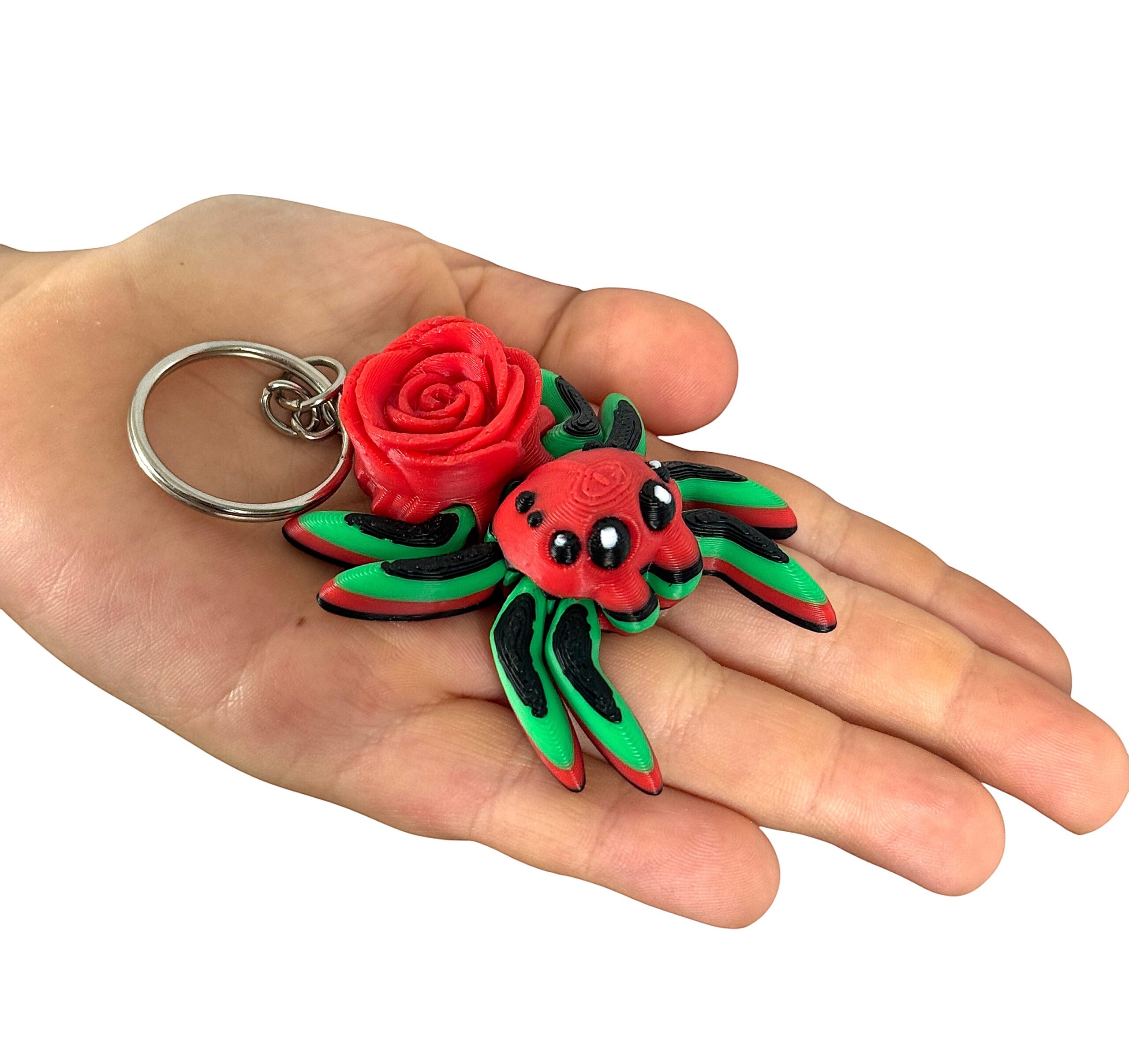 Skakun przegubowy Pajączek z różą – elegancka figurka i stylowy brelok