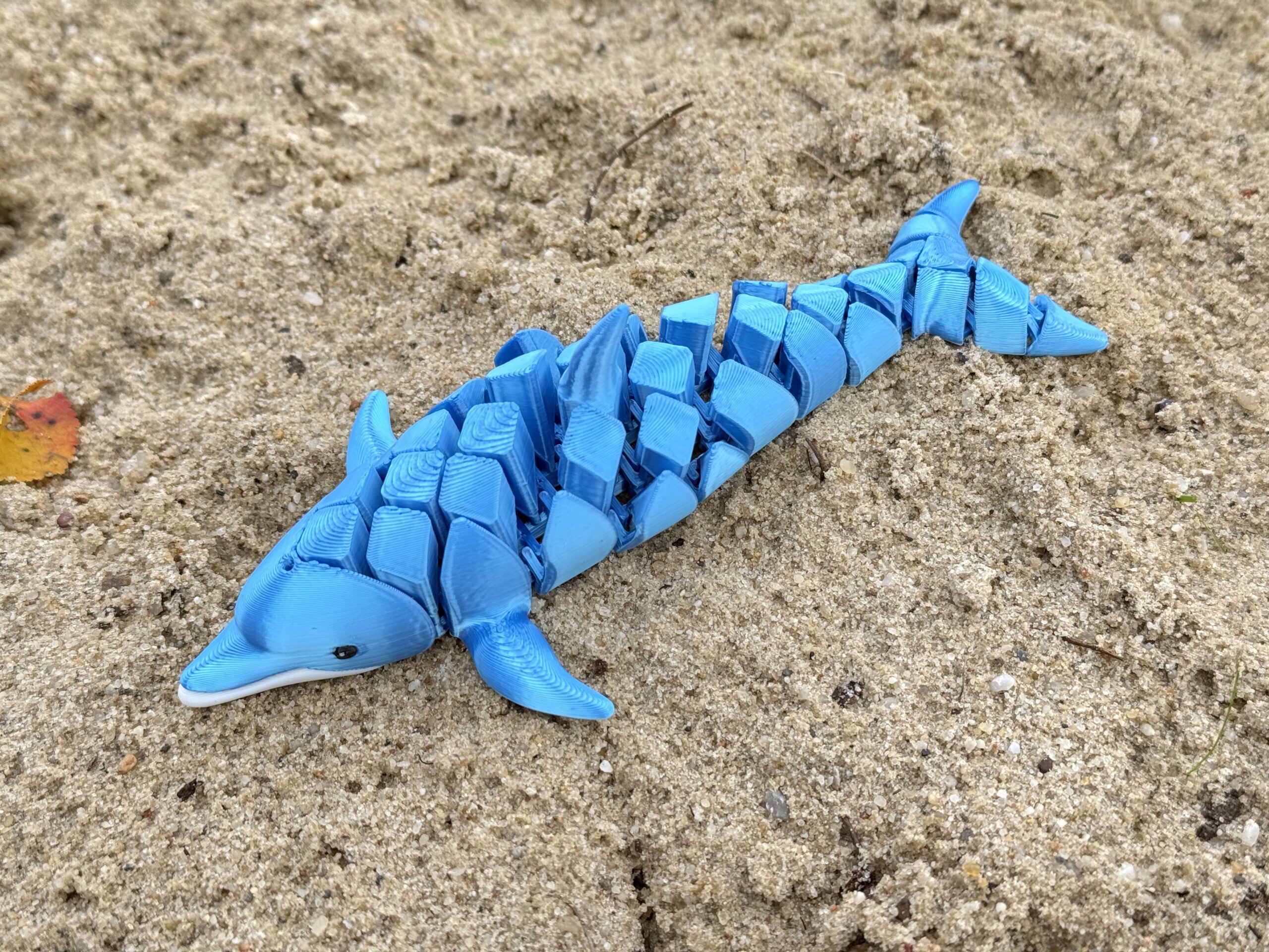 Delfin segmentowy 3D – elastyczna figurka pełna gracji i morskiego uroku! Zabawka - obrazek 11