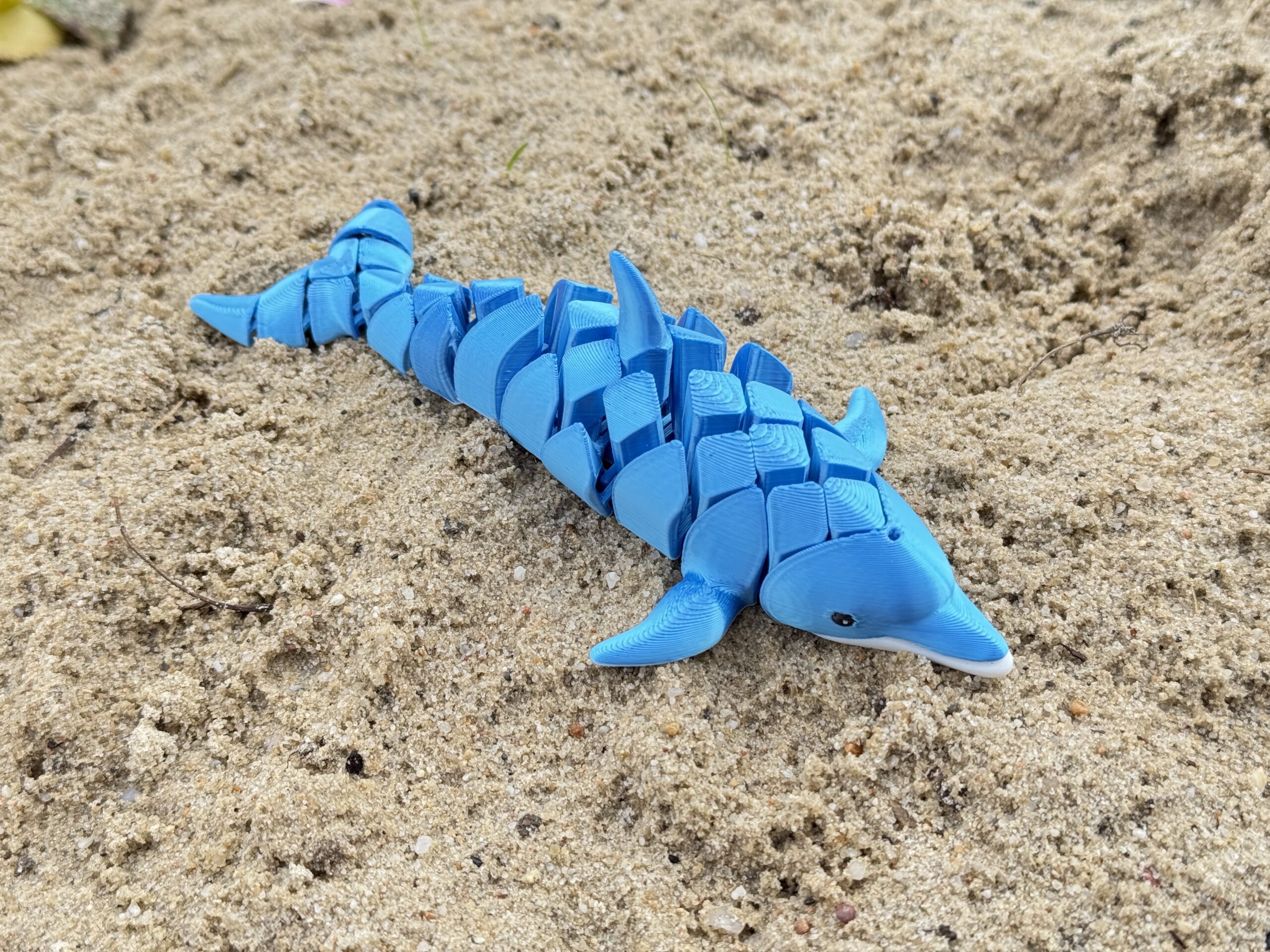 Delfin segmentowy 3D – elastyczna figurka pełna gracji i morskiego uroku! Zabawka - obrazek 10