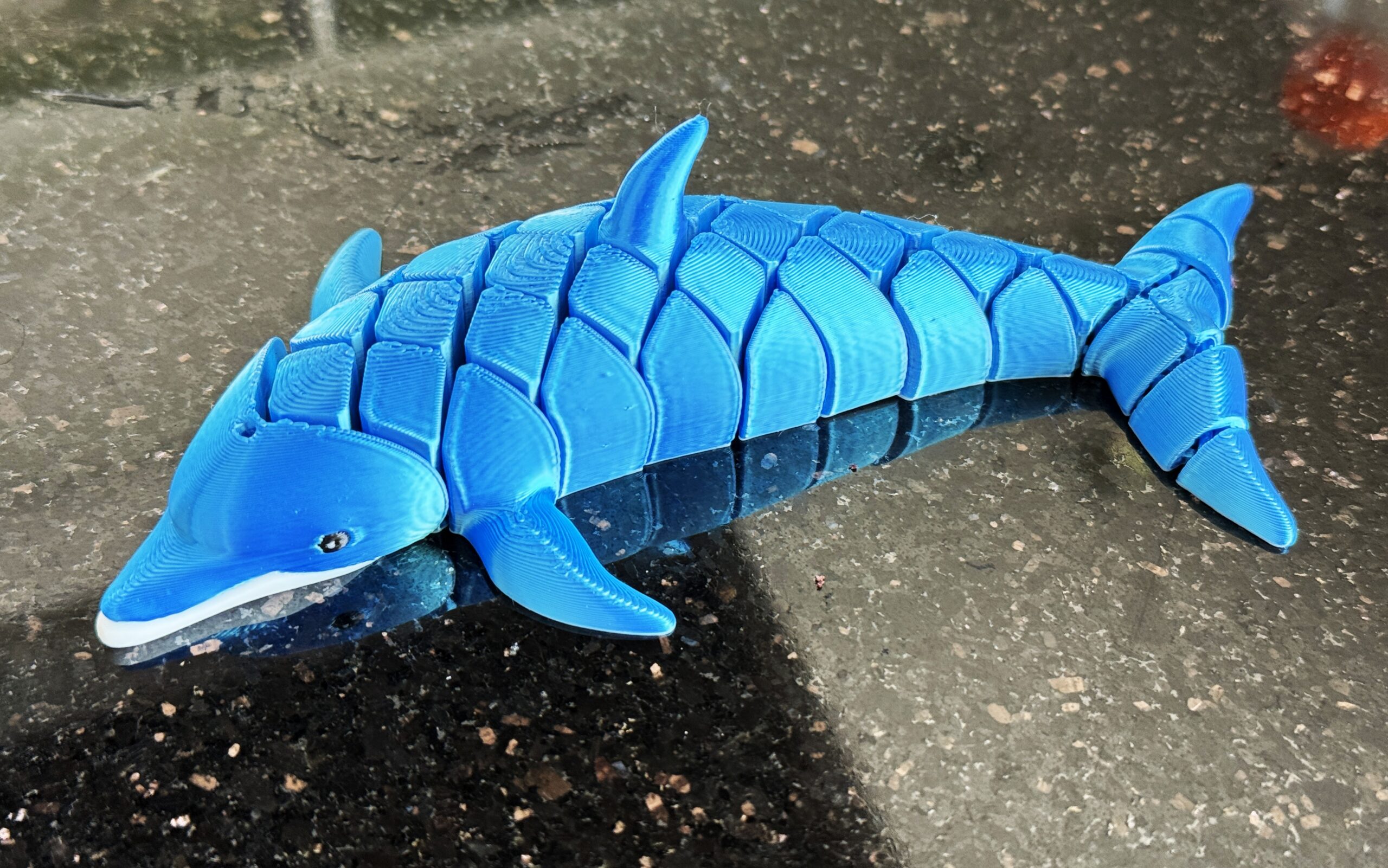 Delfin segmentowy 3D – elastyczna figurka pełna gracji i morskiego uroku! Zabawka - obrazek 7