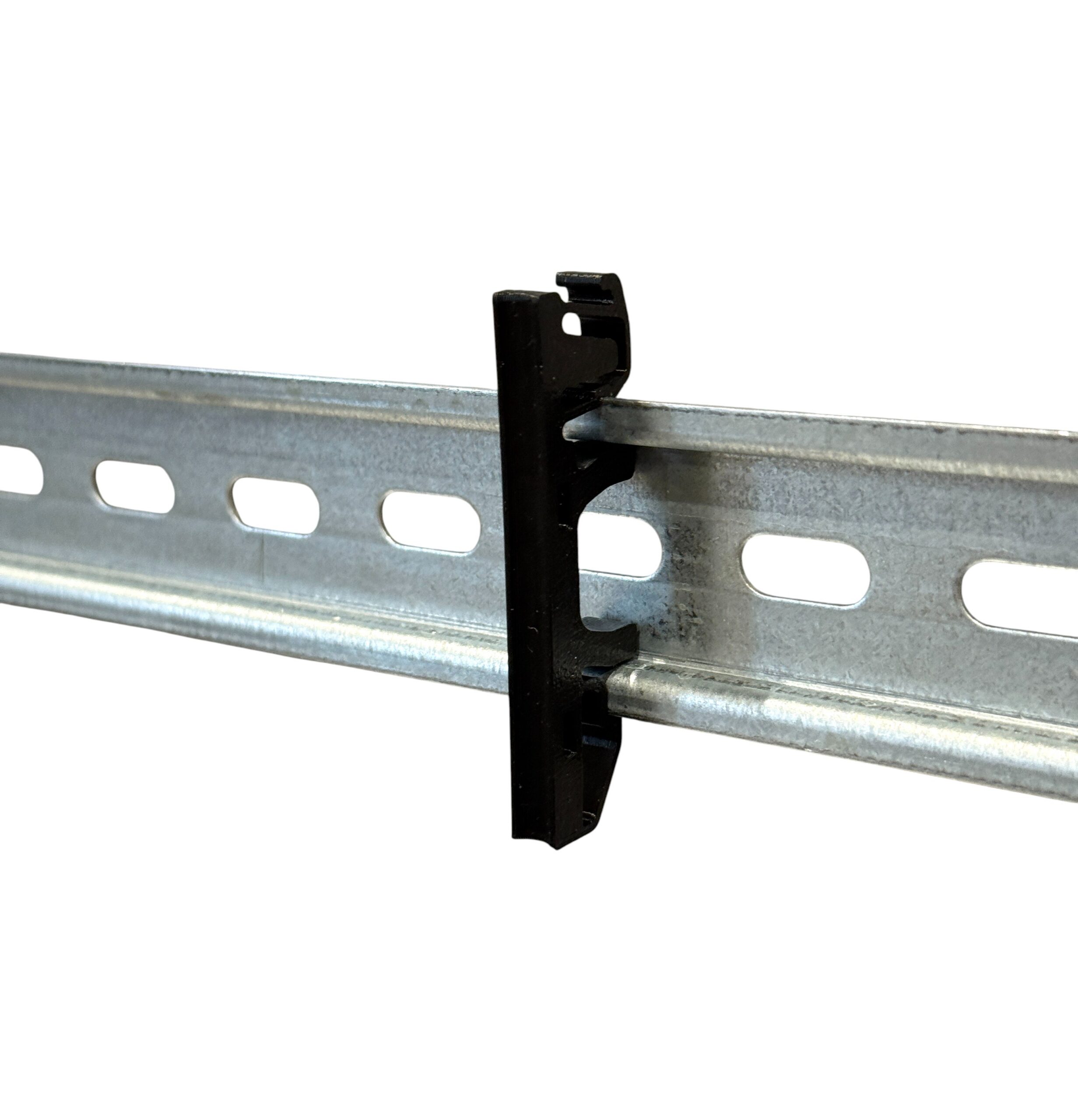 Uchwyt, prowadnica kabla na szynę DIN 35 mm – grubość 6 mm