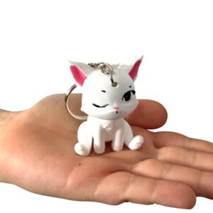 Siedzący kotek puszczający oczko 3D– brelok, mini figurka, zabawka, prezent